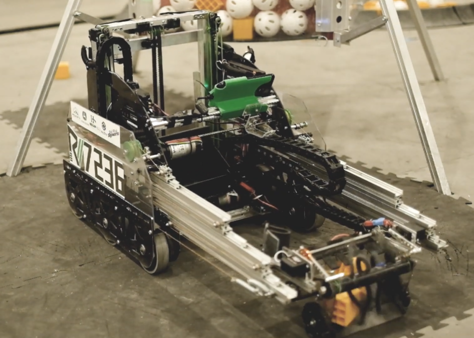 7236 Recharged Green's Rover Ruckus robot with two sets of SAR3 slides both facing the ground on their horizontal extension.